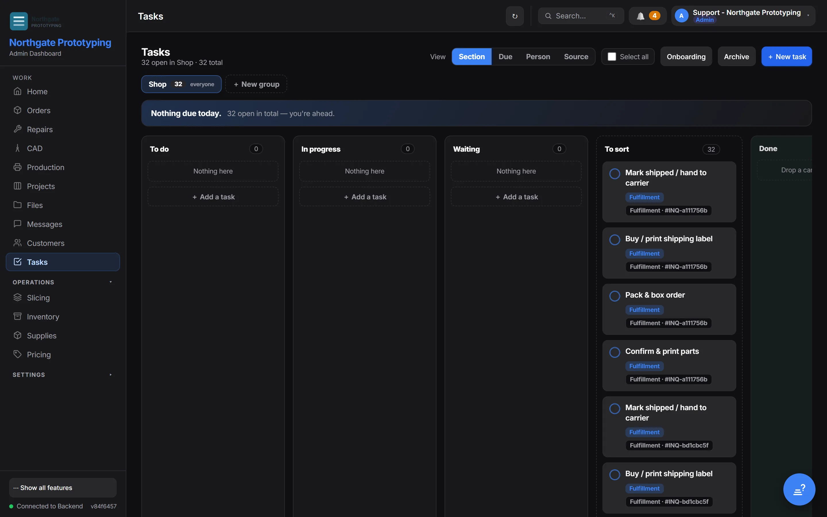 The Tasks page with a group selector, view options by section, due date, person and source, an onboarding checklist and the count of open tasks.